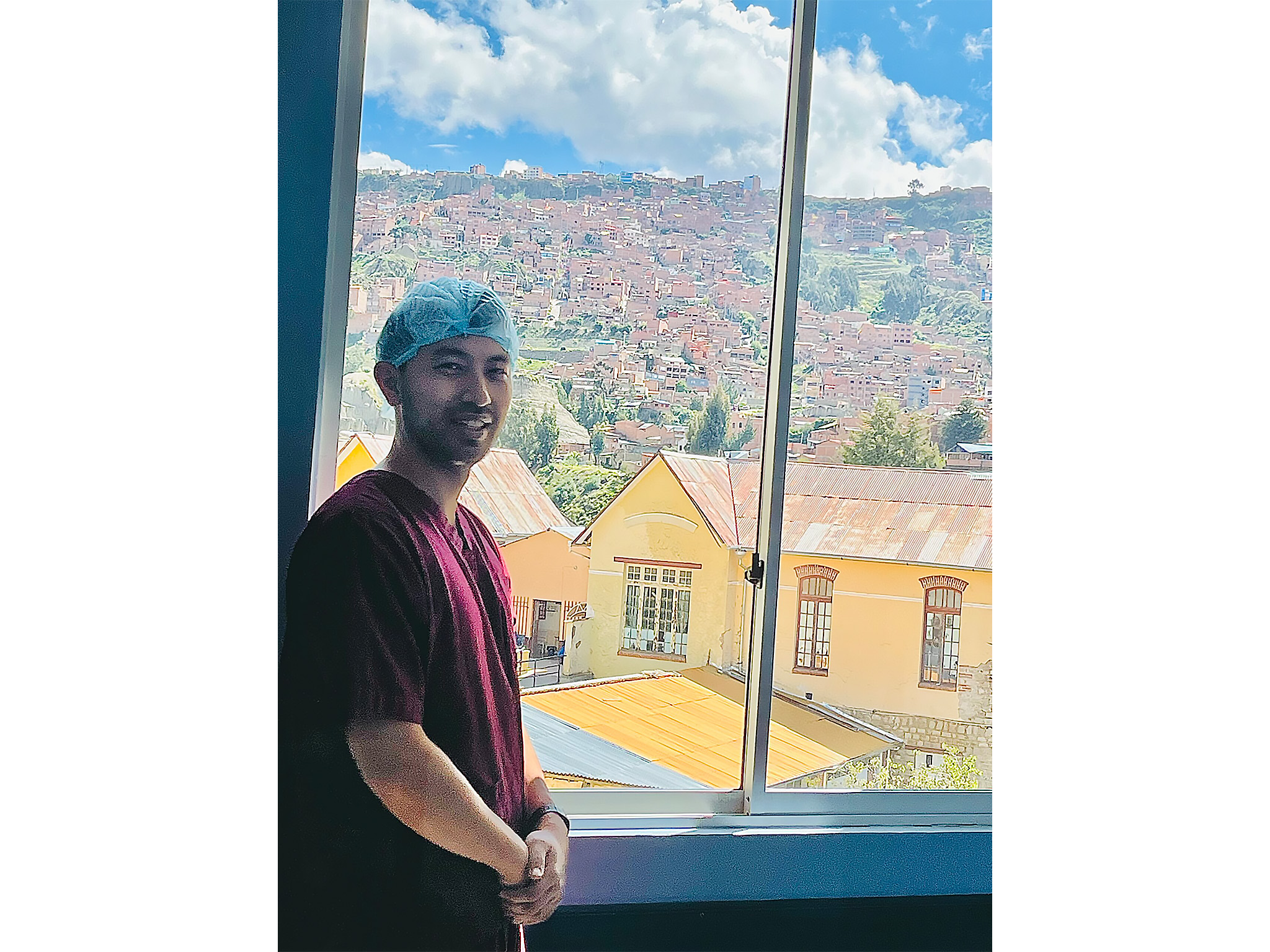 Dr. Victor Lu, Bhatia global fellowship awardee ’24, pictured at host site La Paz hospital in Bolivia, with local mentors Dr. Jose Ramos