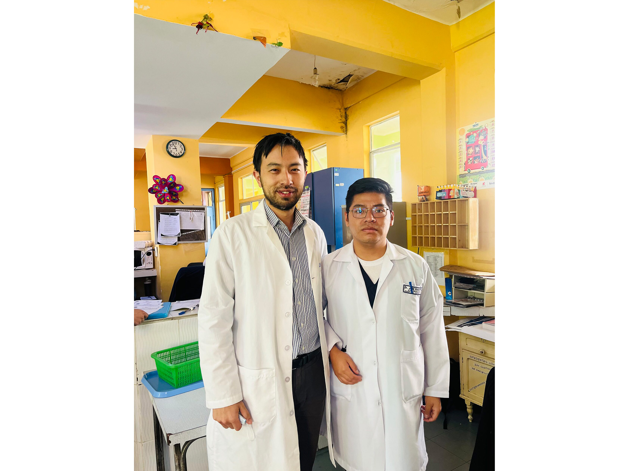 Dr. Victor Lu, Bhatia global fellowship awardee ’24, pictured at host site La Paz hospital in Bolivia, with local mentors Dr. Jose Ramos